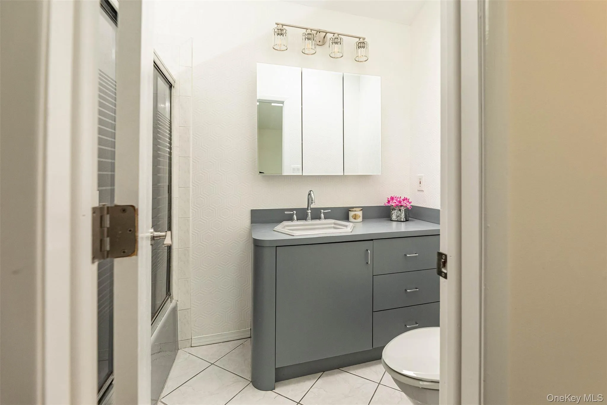 Second floor full bathroom with skylight. Second floor full bathroom with skylight.