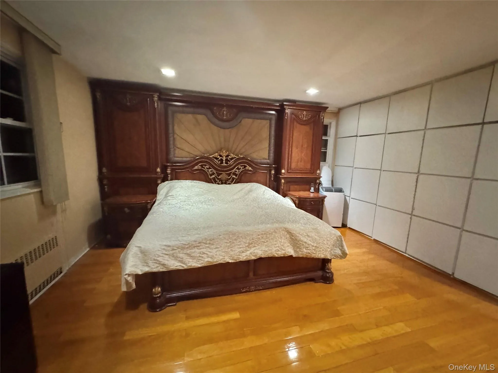 Wood-finish flooring with baseboard heating Wood-finish flooring with baseboard heating