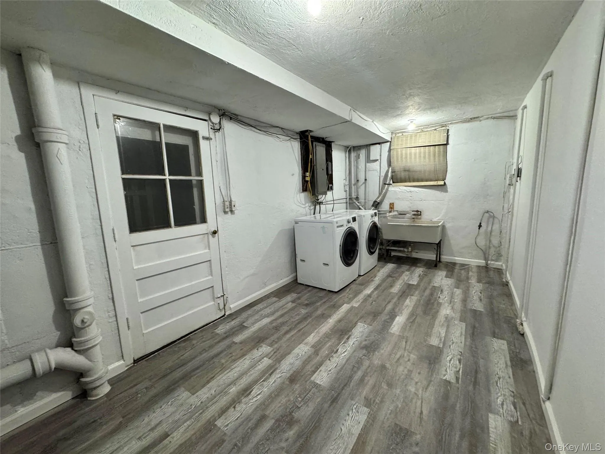 Laundry With door to backyard Laundry With door to backyard