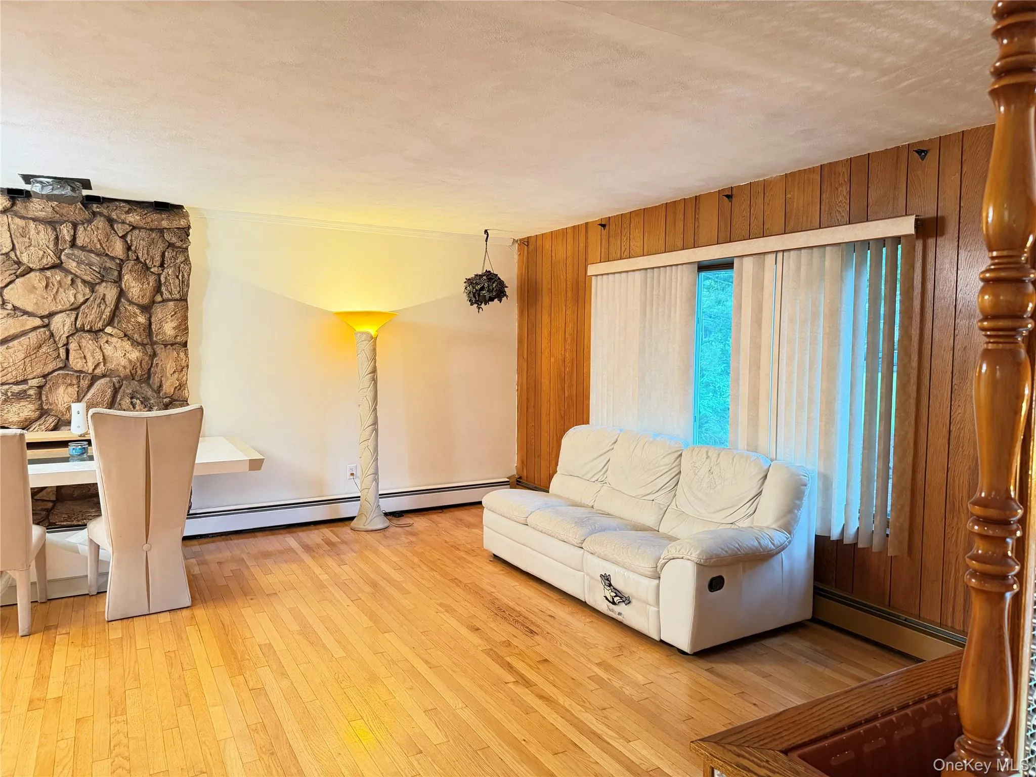 Living room with hardwood floors throughout Living room with hardwood floors throughout