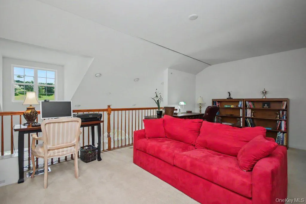 Large loft overlooking the living room below Large loft overlooking the living room below