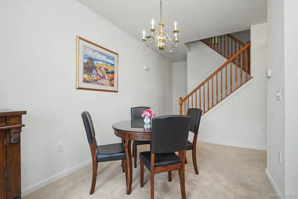 Dining area with staircase to bedrooms Dining area with staircase to bedrooms