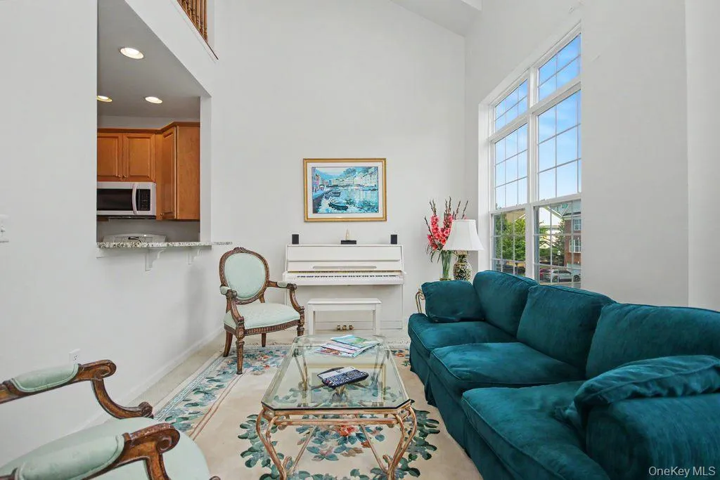 Living room with fireplace and cathedral ceiling Living room with fireplace and cathedral ceiling