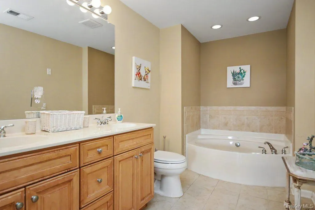 Primary bathroom with jacuzzi type tub Primary bathroom with jacuzzi type tub