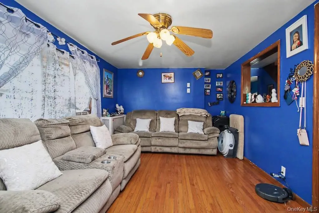 Good sized living room with wood floors Good sized living room with wood floors