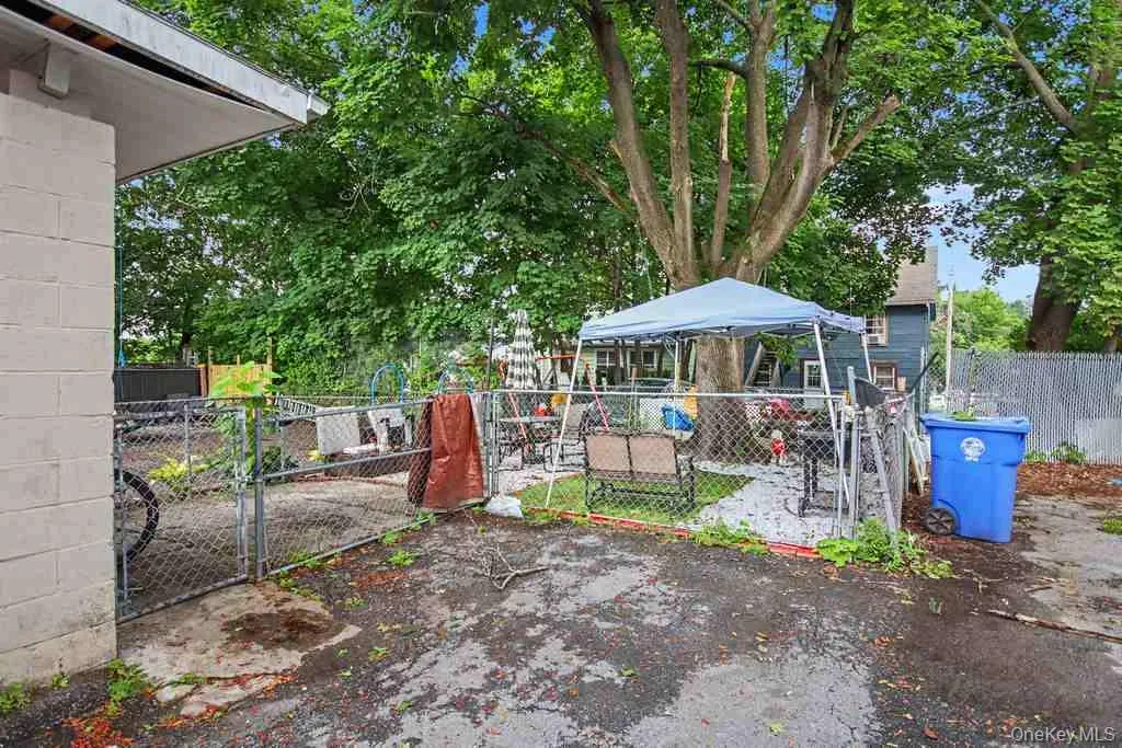 Parking area and back yard Parking area and back yard