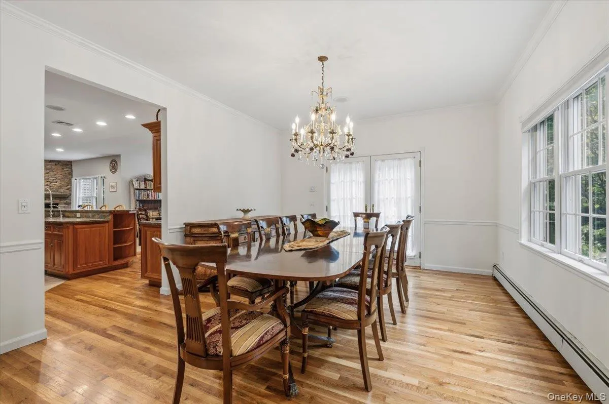 Formal Dinning Room w/ French Doors Out To Backyard Formal Dinning Room w/ French Doors Out To Backyard