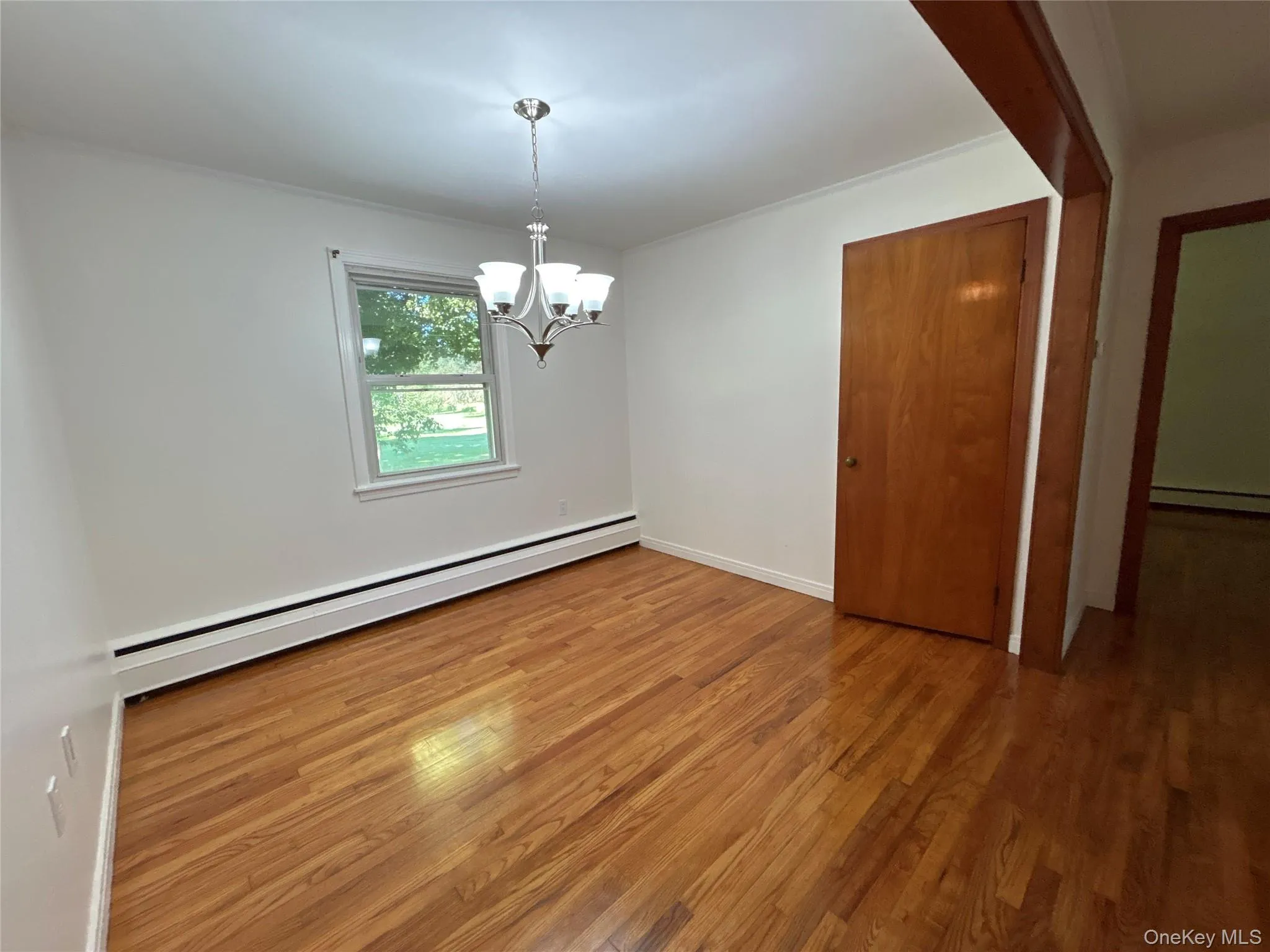 Formal dining room. This could be used as a flex space such as an office or additional sitting area Formal dining room. This could be used as a flex space such as an office or additional sitting area