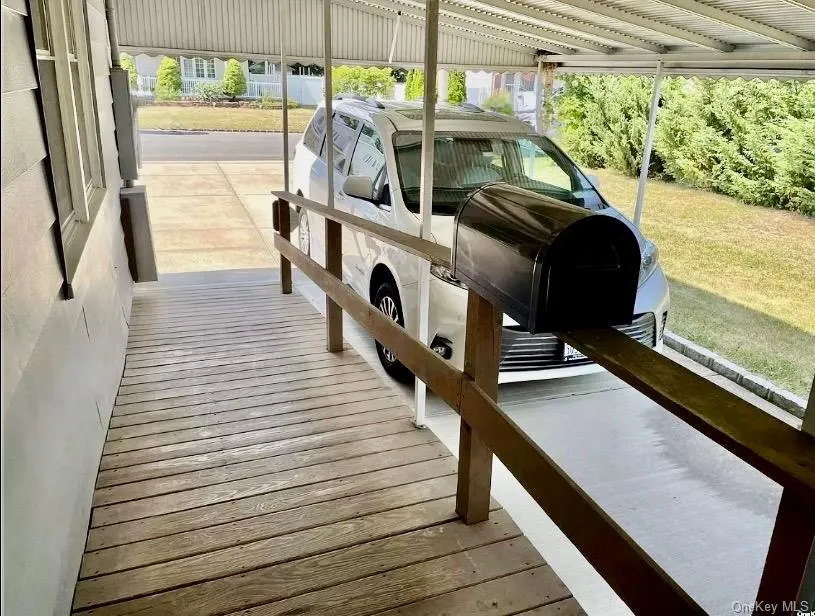 Car port and ramp to house entrance Car port and ramp to house entrance