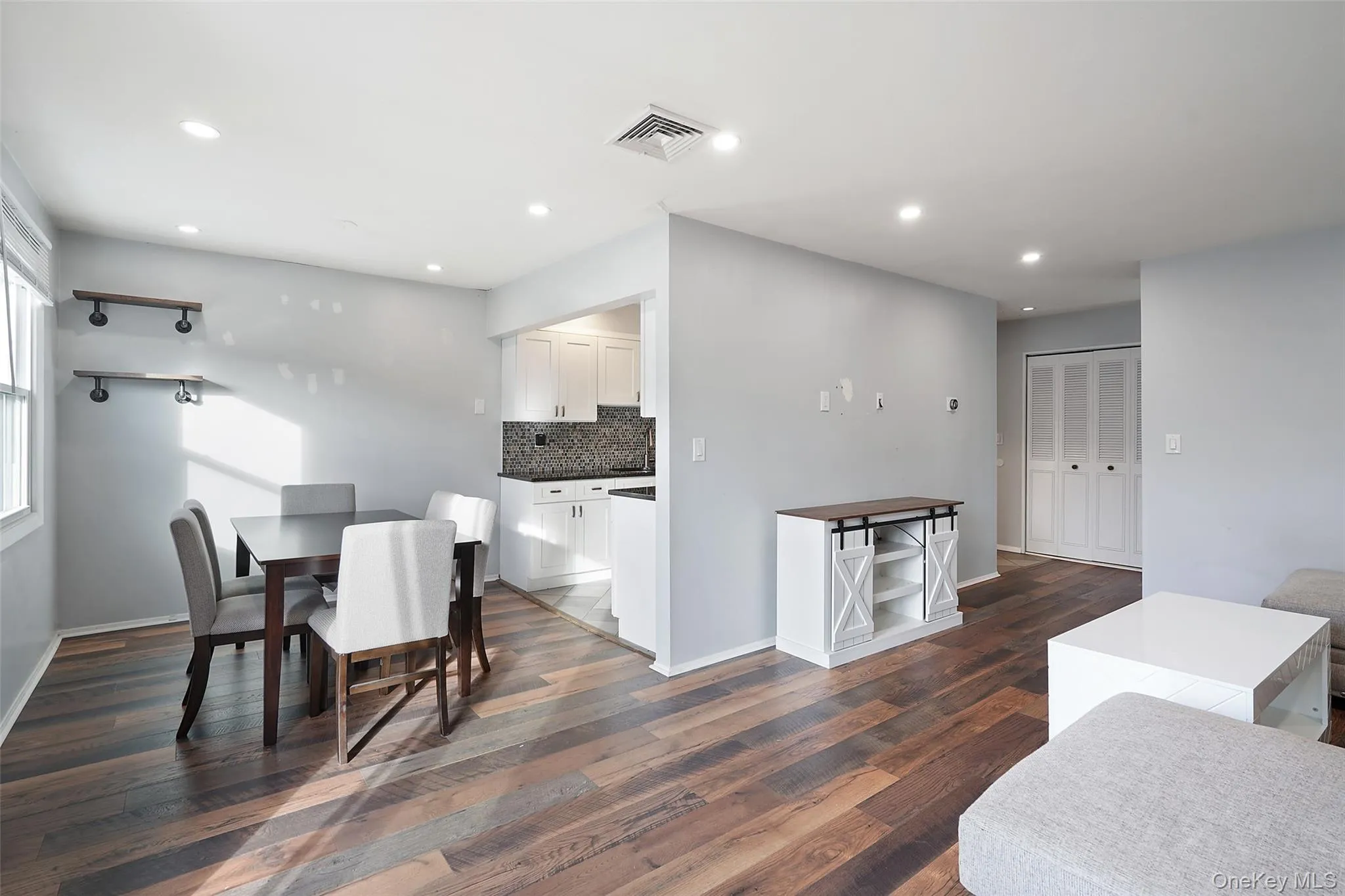 Dining room featuring dark hardwood / wood-style floors Dining room featuring dark hardwood / wood-style floors