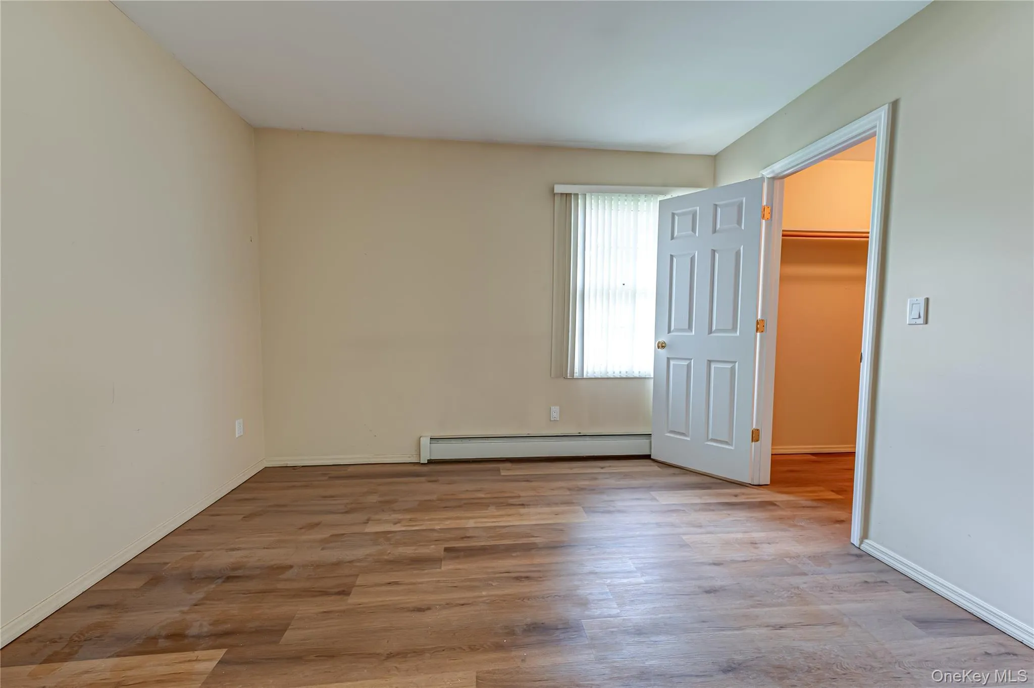 Bedroom with new vinyl wood like flooring Bedroom with new vinyl wood like flooring