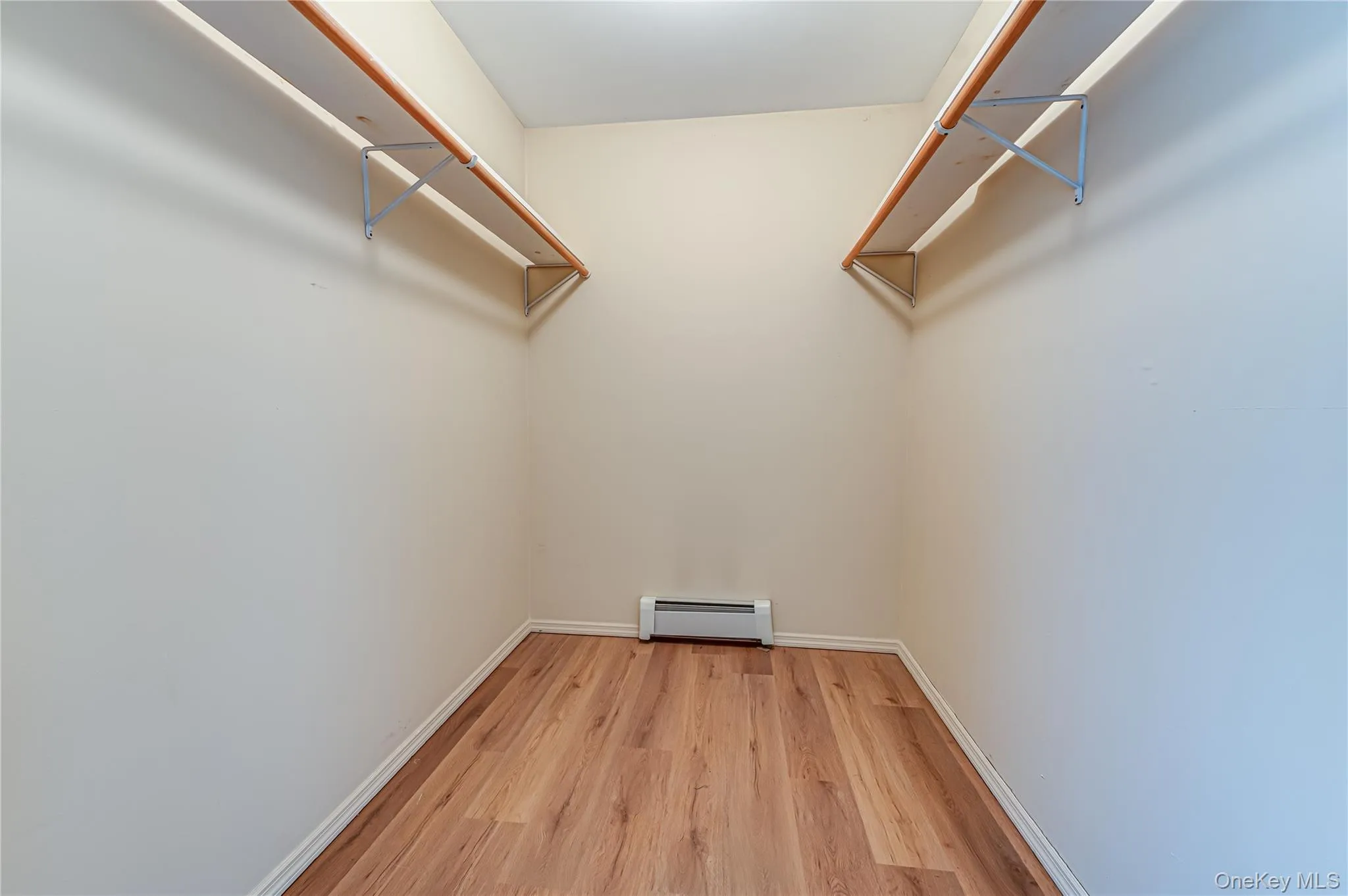 Vinyl Wood-finish flooring with white trim Vinyl Wood-finish flooring with white trim