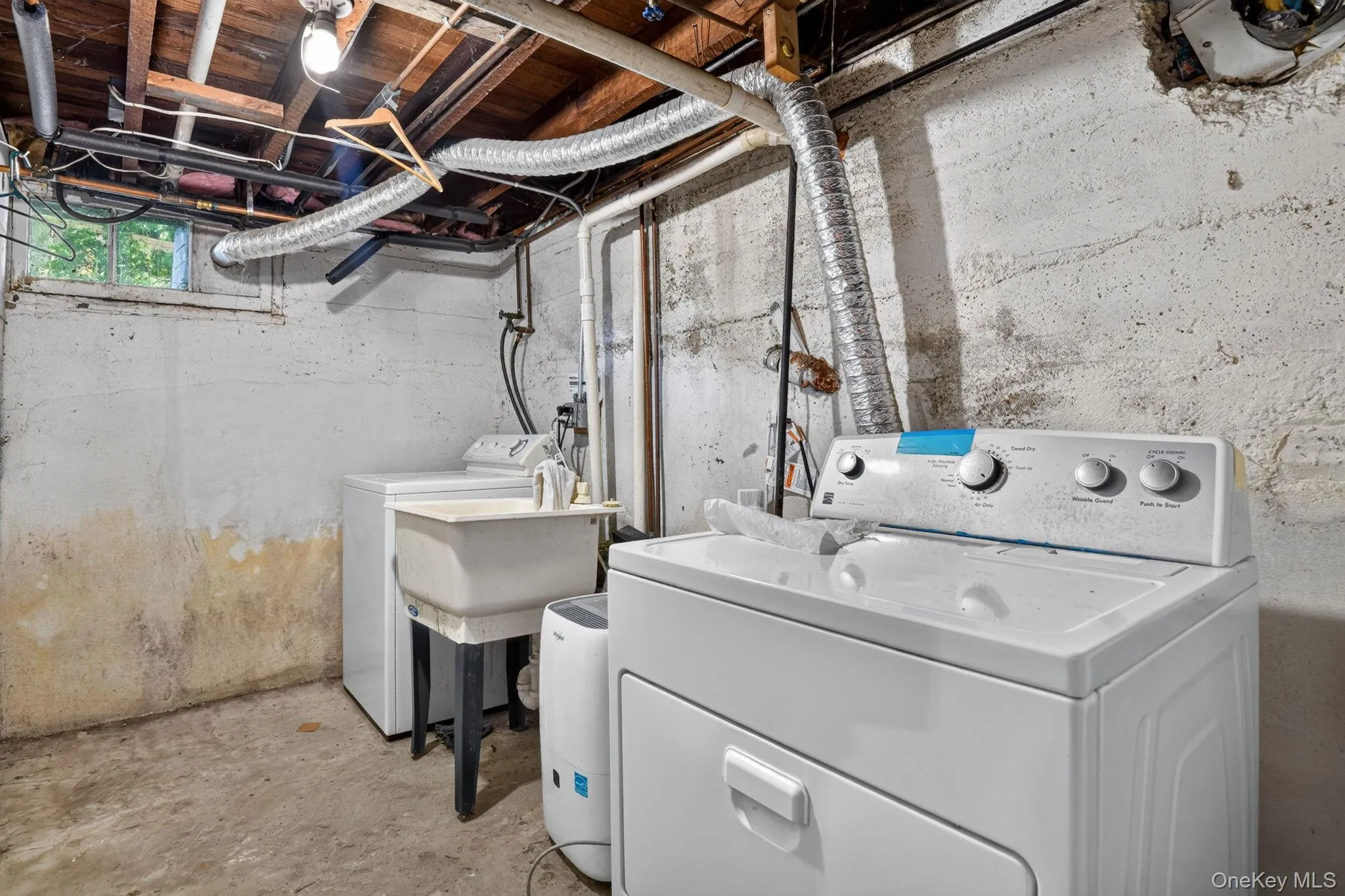 Basement Laundry with utility sink Basement Laundry with utility sink