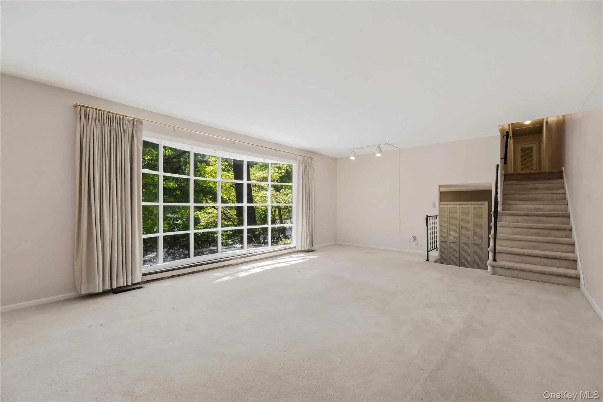 Living room stairs to upper floor and bedrooms Living room stairs to upper floor and bedrooms