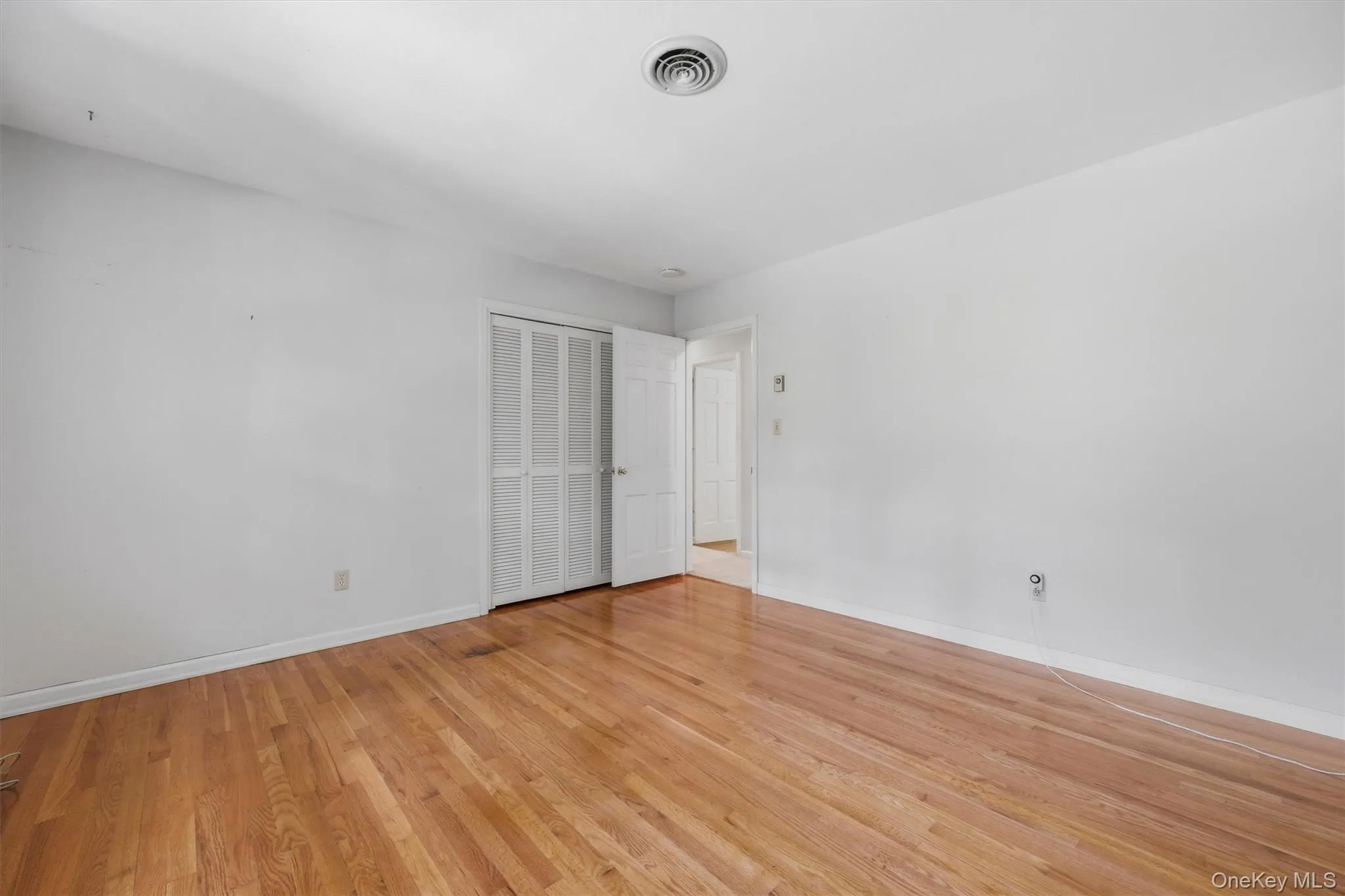 Bedroom 2 with hardwood floors Bedroom 2 with hardwood floors