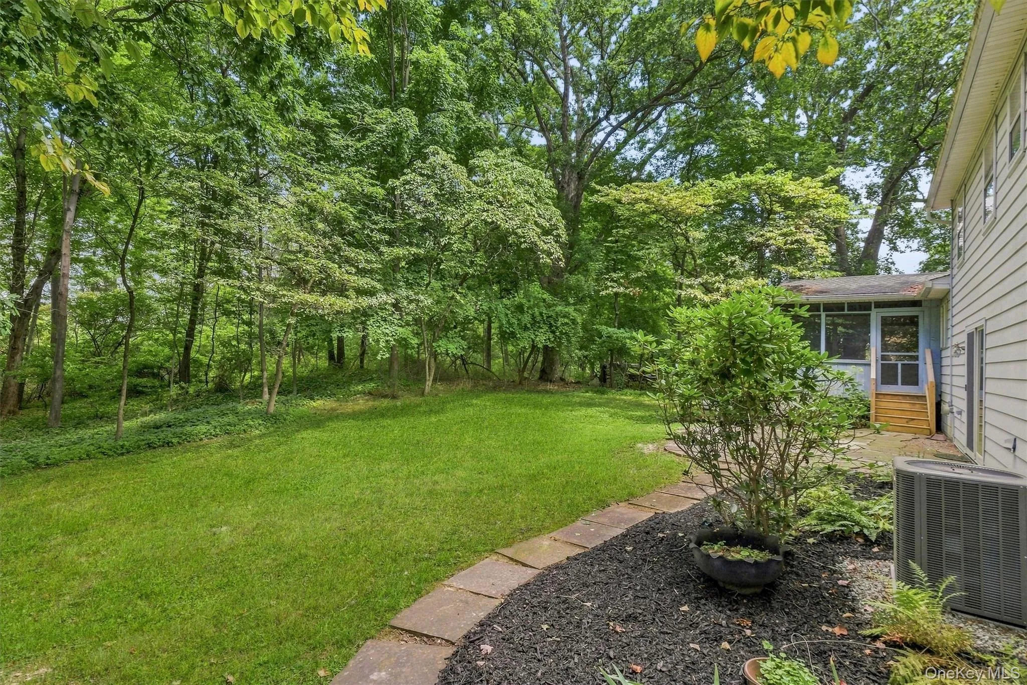 Nice backyard with privacy of woods in rear Nice backyard with privacy of woods in rear