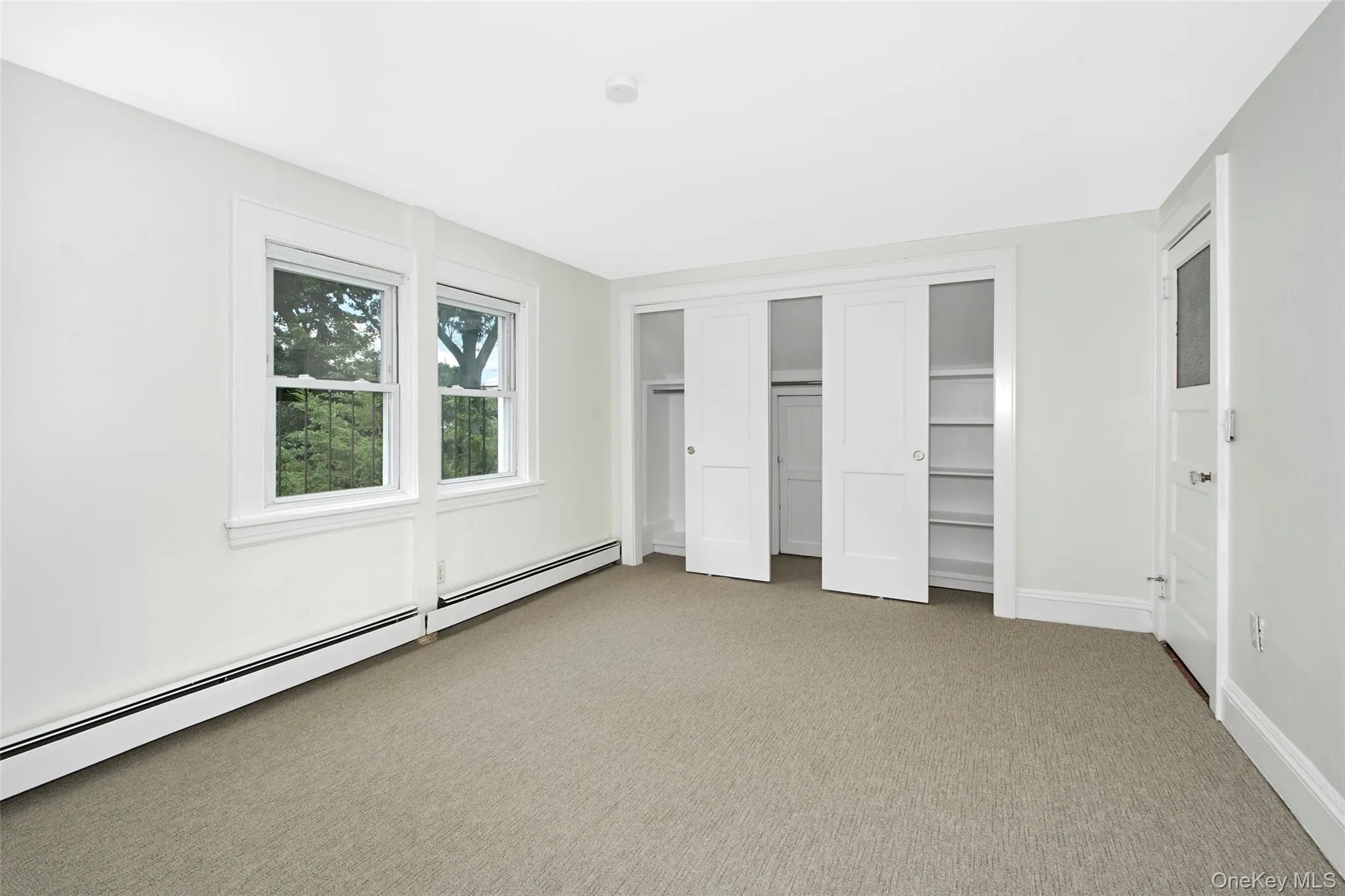 Upstairs bedroom w/ built in closets Upstairs bedroom w/ built in closets