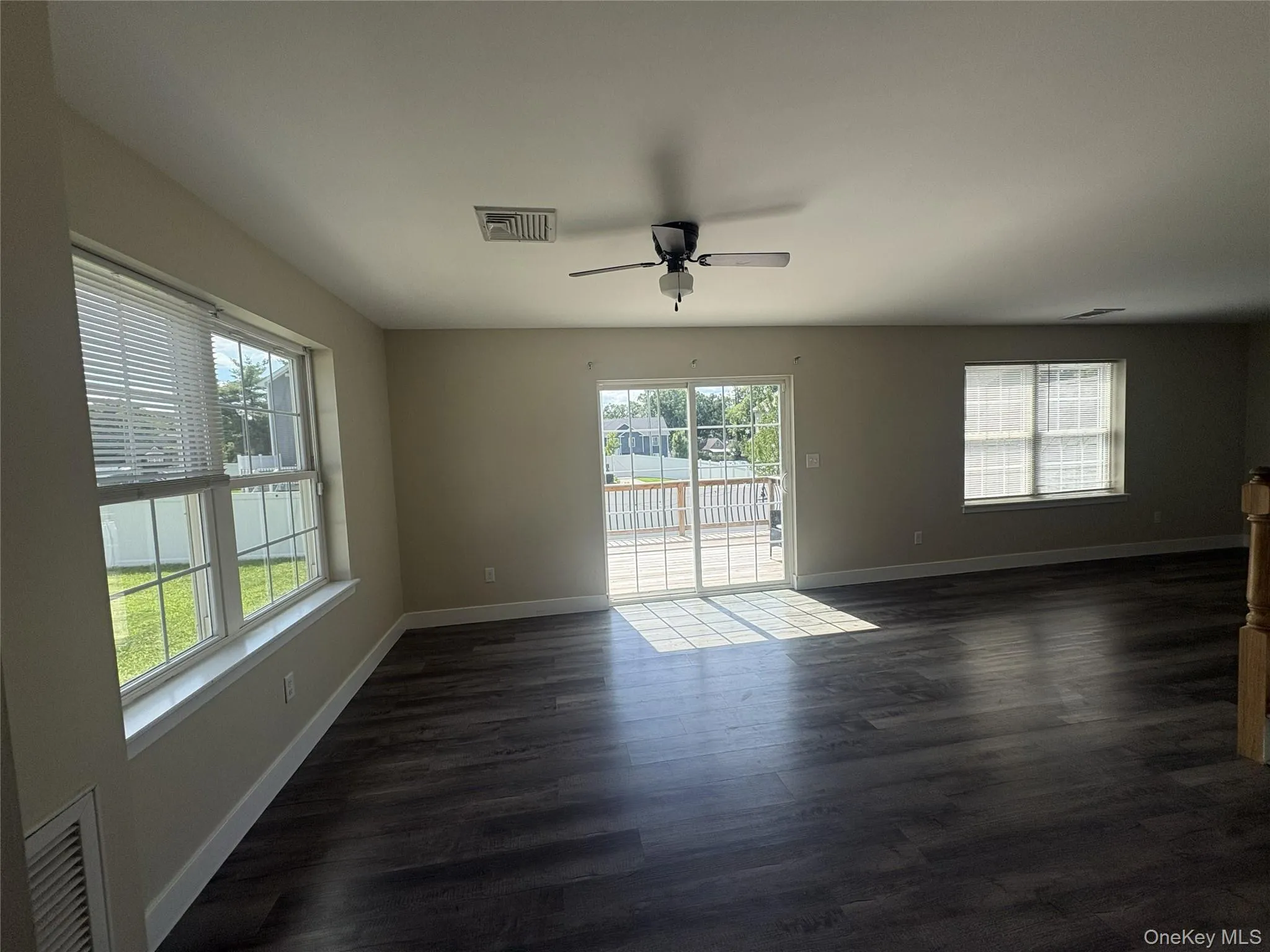 Neutral-toned walls with wood-finish flooring Neutral-toned walls with wood-finish flooring