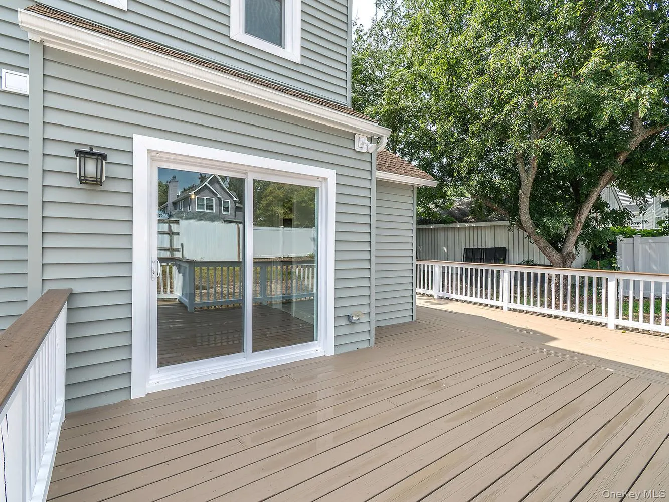 The private deck extends the living space outdoors, offering the perfect spot for dining, entertaining, or relaxing. The private deck extends the living space outdoors, offering the perfect spot for dining, entertaining, or relaxing.