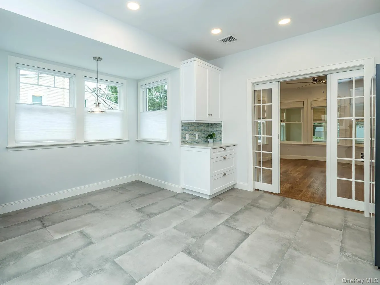 The beautifully renovated eat-in kitchen features modern finishes, new appliances, and a bright, functional layout designed for everyday living and entertaining. The beautifully renovated eat-in kitchen features modern finishes, new appliances, and a bright, functional layout designed for everyday living and entertaining.