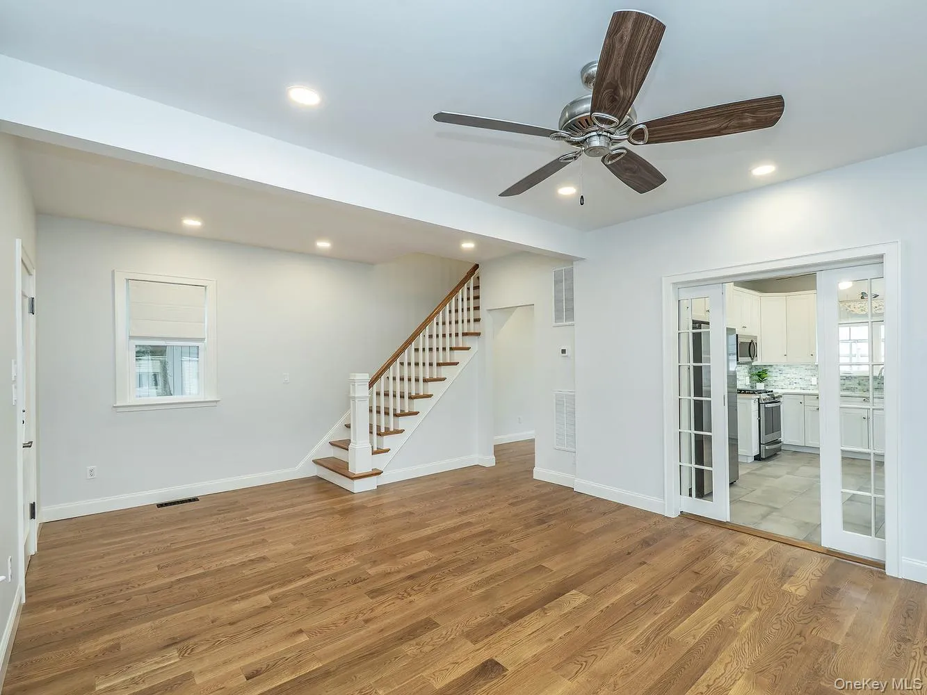 Sliding glass doors between the dining room and kitchen can be opened for a seamless flow or closed for added privacy. Sliding glass doors between the dining room and kitchen can be opened for a seamless flow or closed for added privacy.
