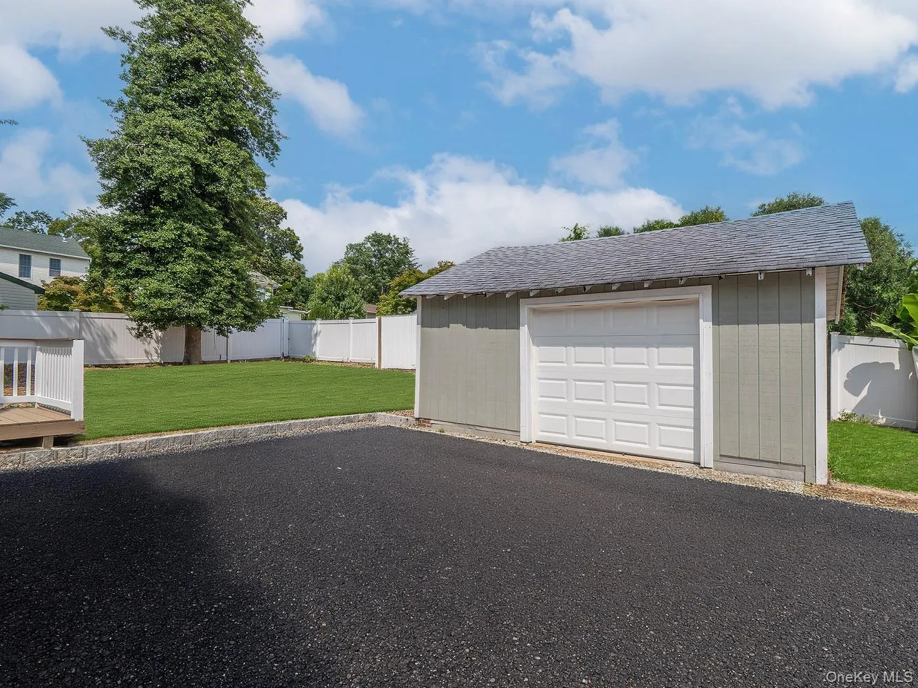 Full garage. Digitally enhanced; driveway will be paved and backyard seeded before move-in. Full garage. Digitally enhanced; driveway will be paved and backyard seeded before move-in.