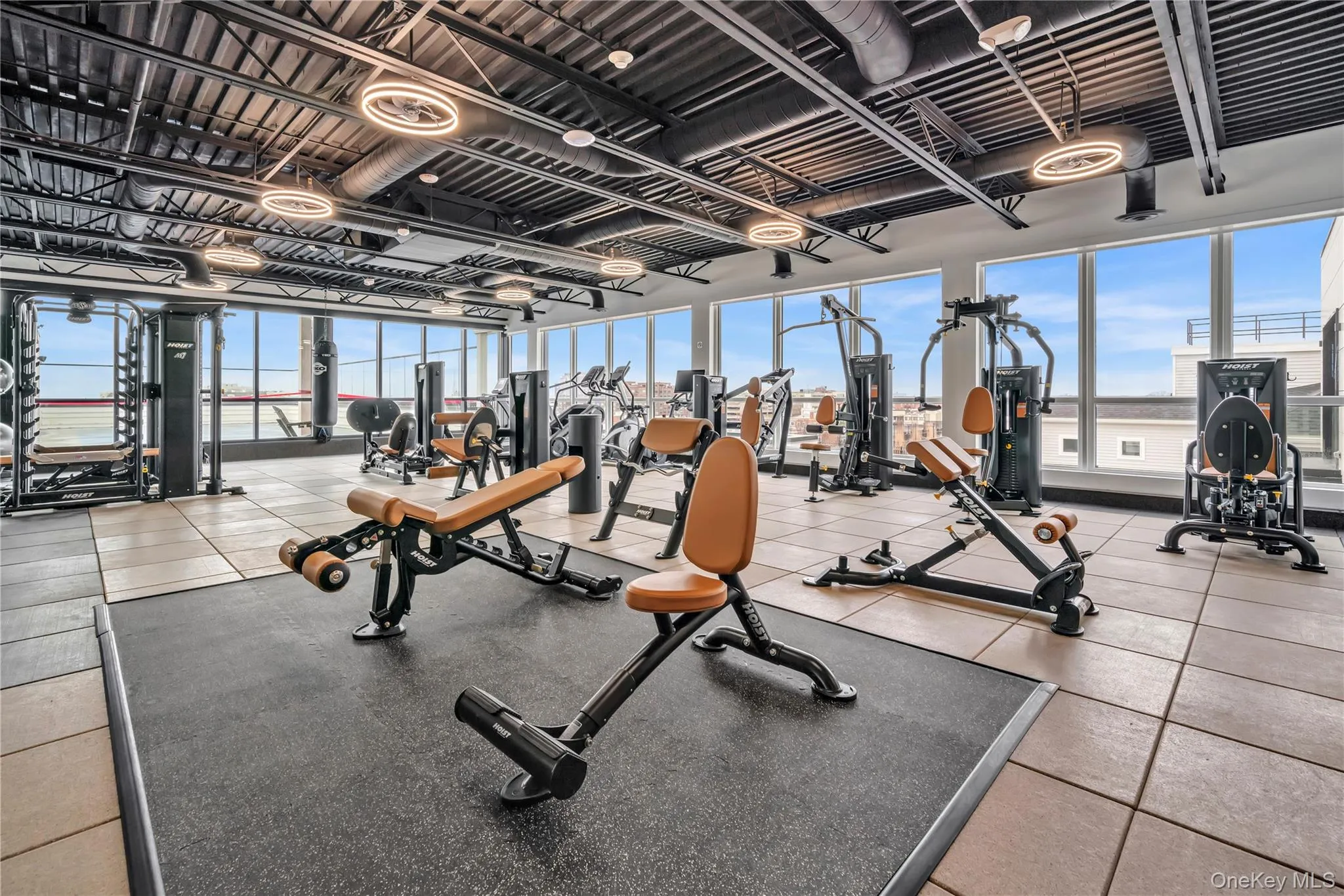 Exercise room featuring plenty of natural light Exercise room featuring plenty of natural light