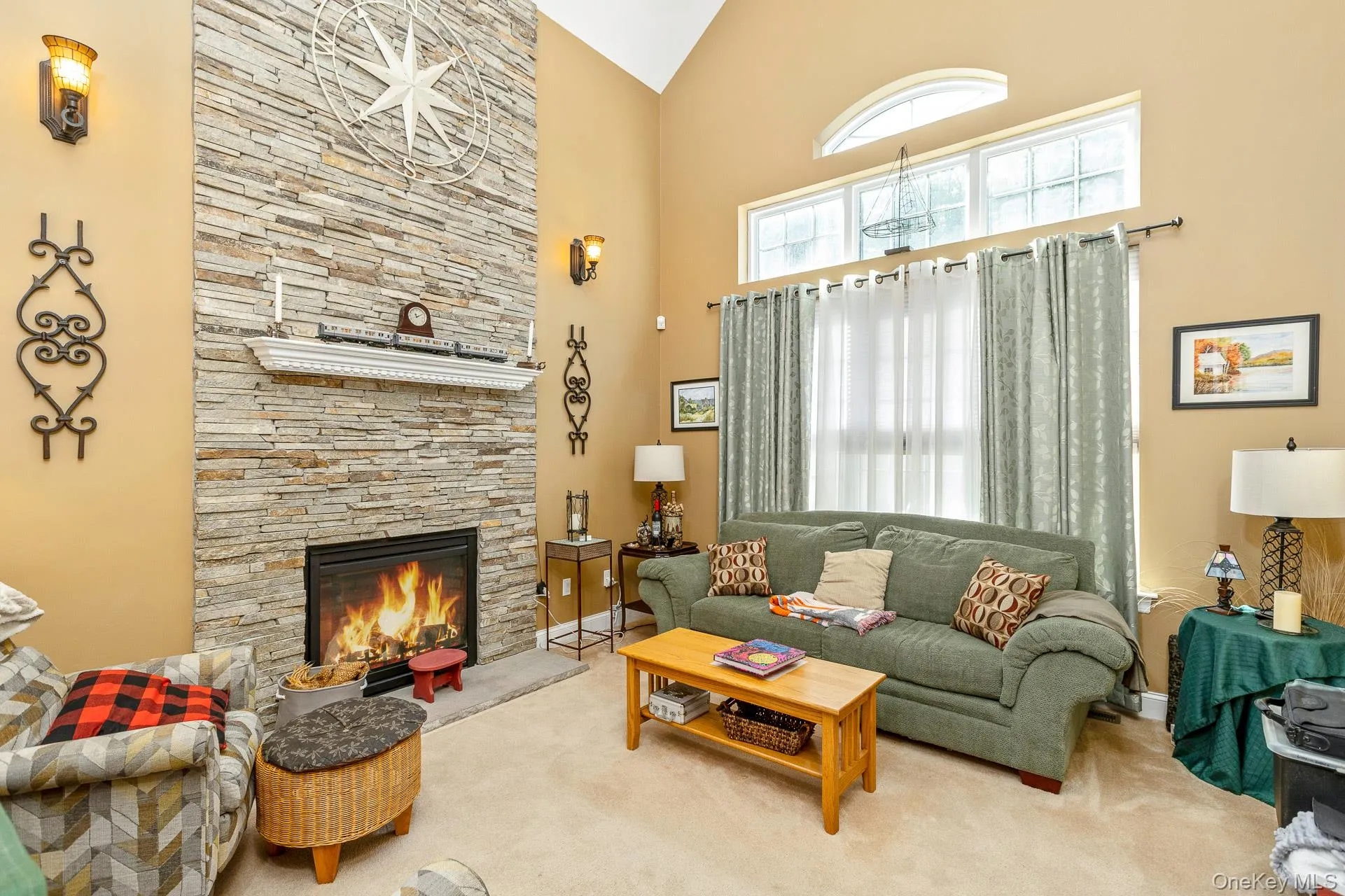Beautiful Den with a Gas fireplace and a Vaulted ceiling Beautiful Den with a Gas fireplace and a Vaulted ceiling