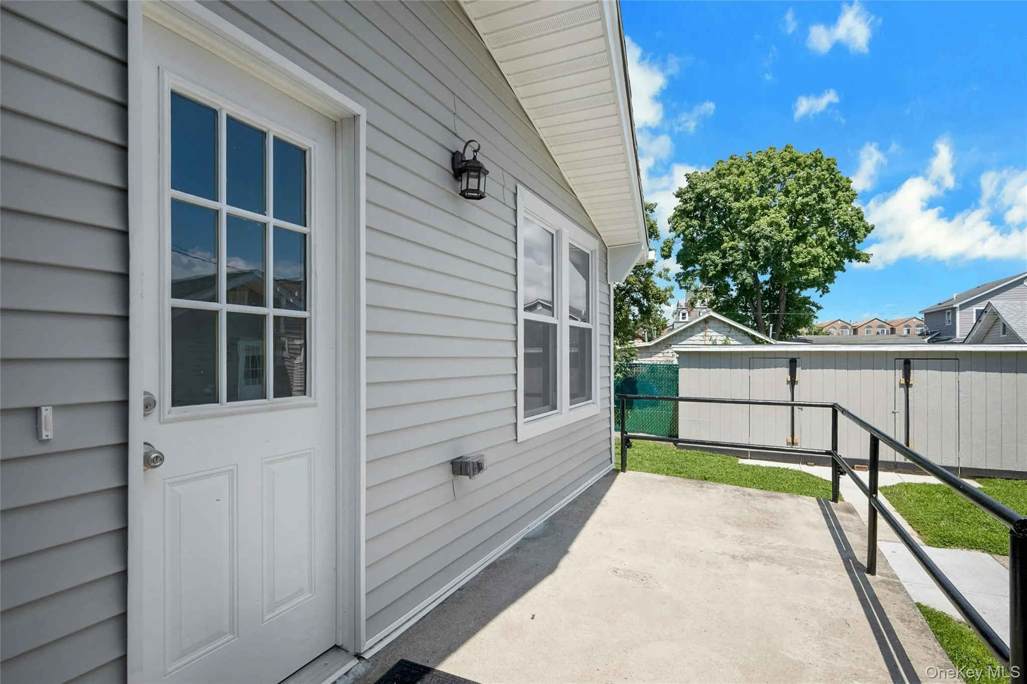 Over 200 Sq Ft front porch with views of the Long Island Sound Over 200 Sq Ft front porch with views of the Long Island Sound