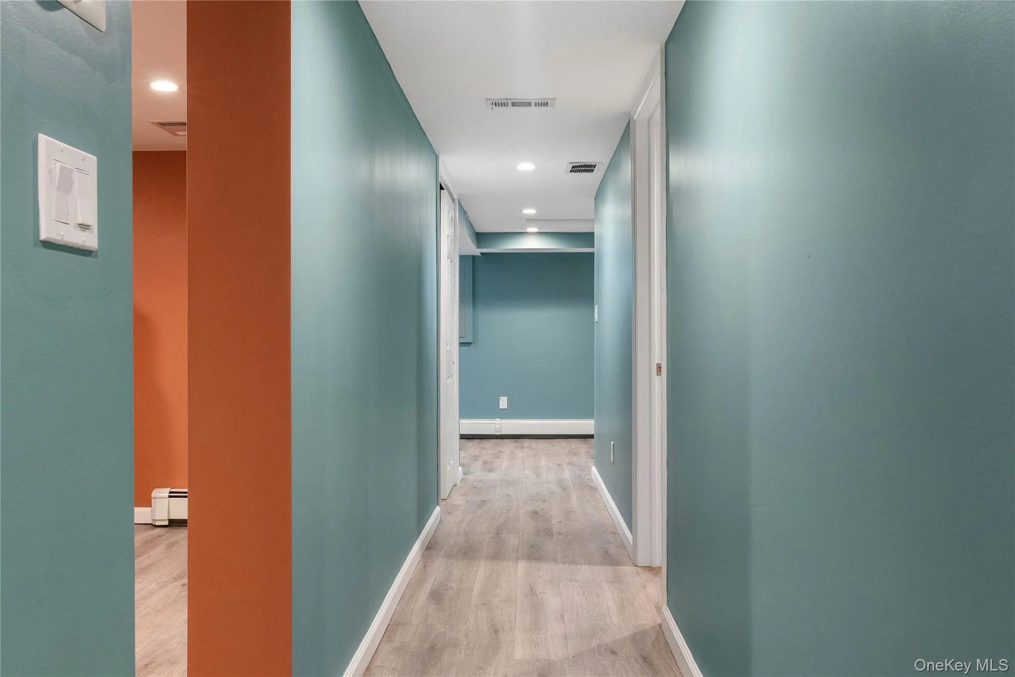 Basement Hallway with Storage Space and Entertainment Space Basement Hallway with Storage Space and Entertainment Space