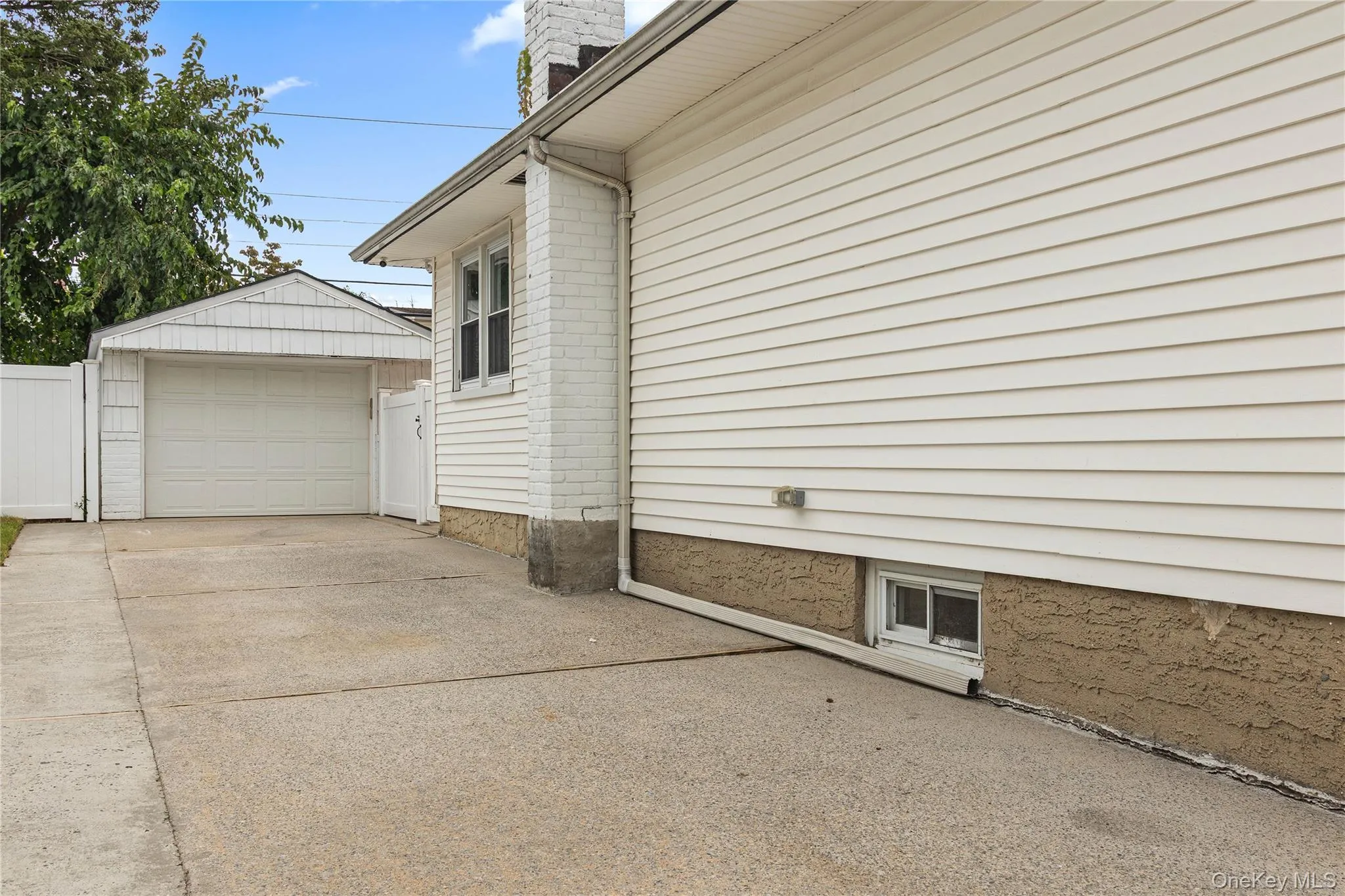 View of Garage from Long Driveway and Side of Home View of Garage from Long Driveway and Side of Home
