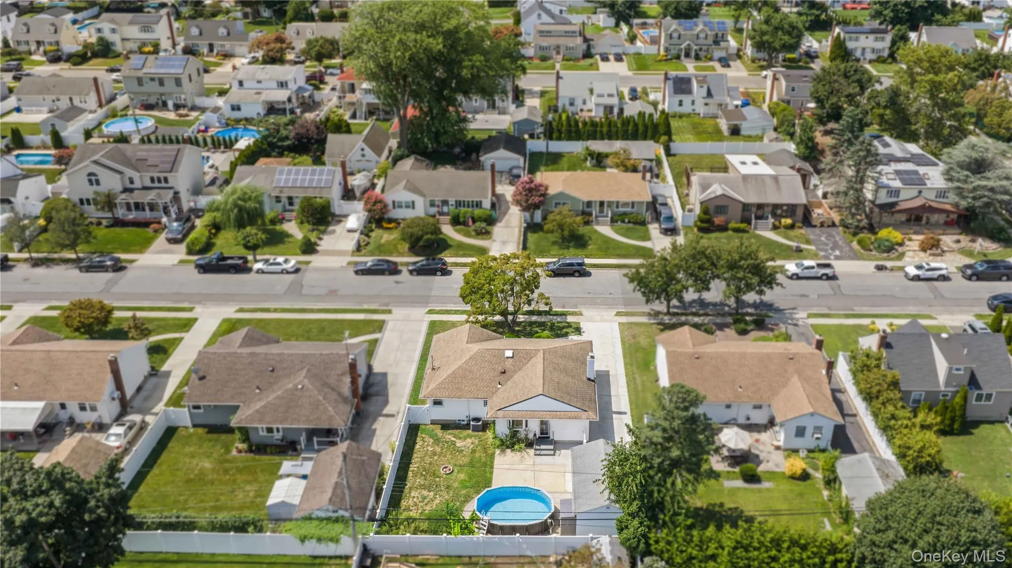 View from Drone of Backyard, Patio, and Outdoor Entertainment Space View from Drone of Backyard, Patio, and Outdoor Entertainment Space