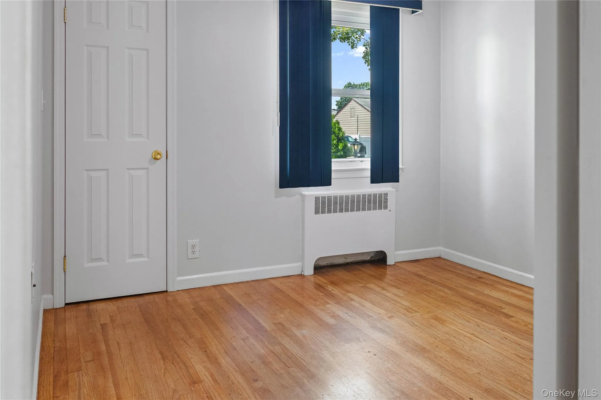 Bedroom 3 with Gleaming Hardwood Floor, Bright Windows and Closet Bedroom 3 with Gleaming Hardwood Floor, Bright Windows and Closet