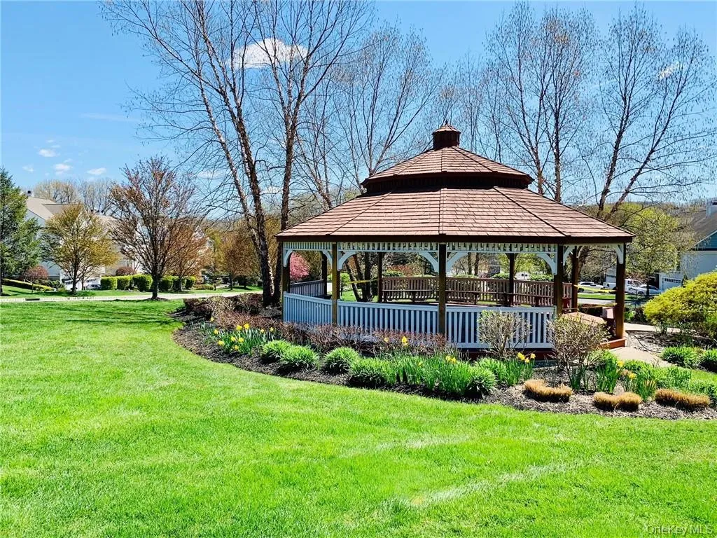 View of home's community with a yard and a gazebo View of home's community with a yard and a gazebo
