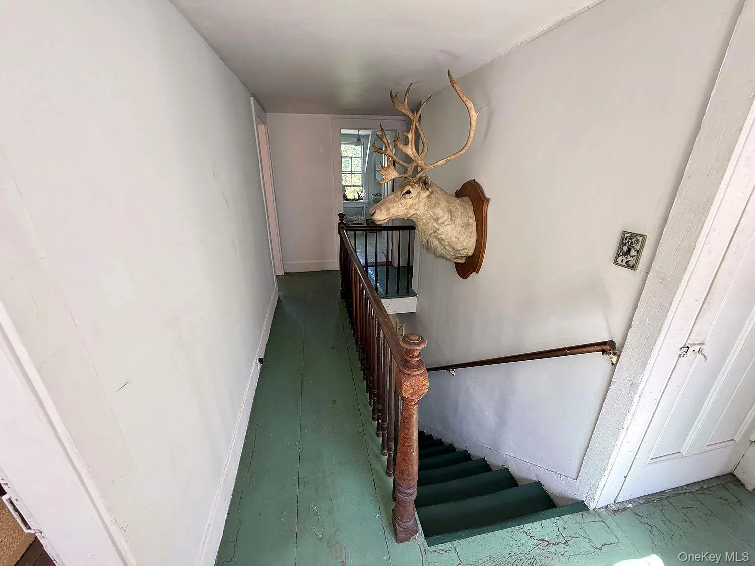 Upstairs hall leads to 4 BR and a full bath Upstairs hall leads to 4 BR and a full bath