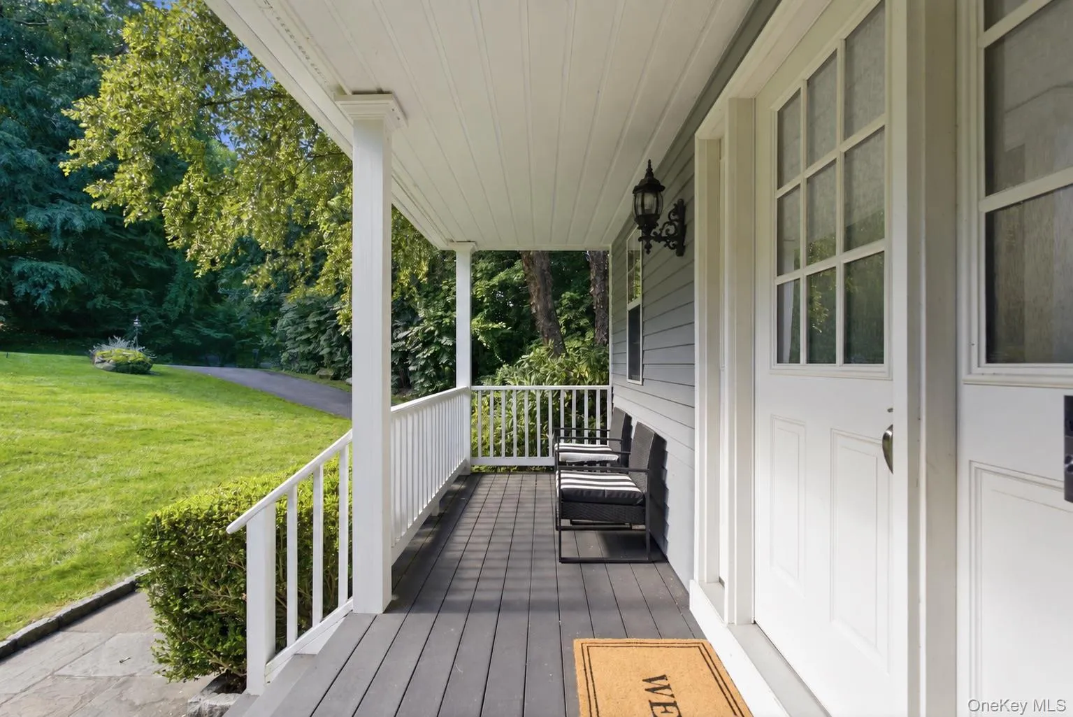 Gracious covered portico offers a welcoming entrance, rain or shine. Gracious covered portico offers a welcoming entrance, rain or shine.