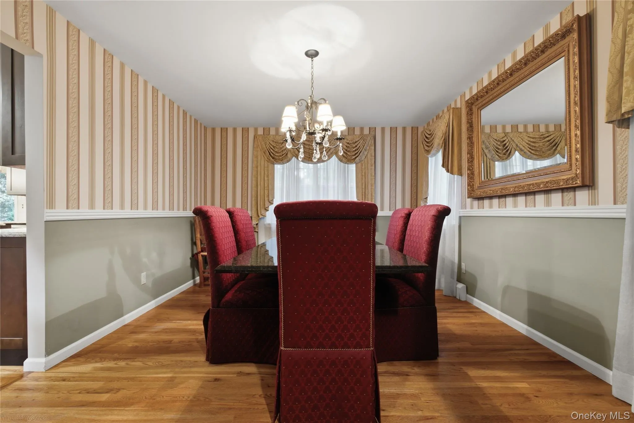 Formal Dining Room Flows Seamlessly from the Kitchen, Creating an Ideal Setting for Effortless entertaining. Formal Dining Room Flows Seamlessly from the Kitchen, Creating an Ideal Setting for Effortless entertaining.