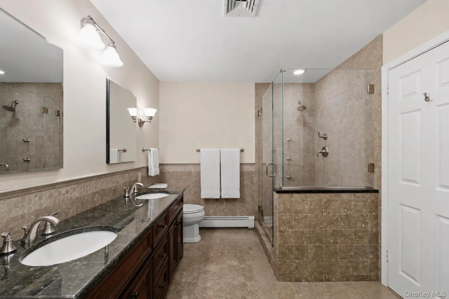 Alternate View of the Primary Ensuite Bathroom Spa Shower, and Double Sinks. Alternate View of the Primary Ensuite Bathroom Spa Shower, and Double Sinks.