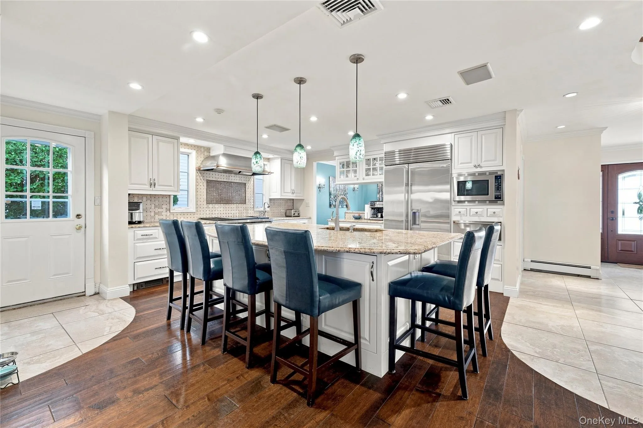 Top-of-the-line chef's open kitchen with island seating for 6. Top-of-the-line chef's open kitchen with island seating for 6.