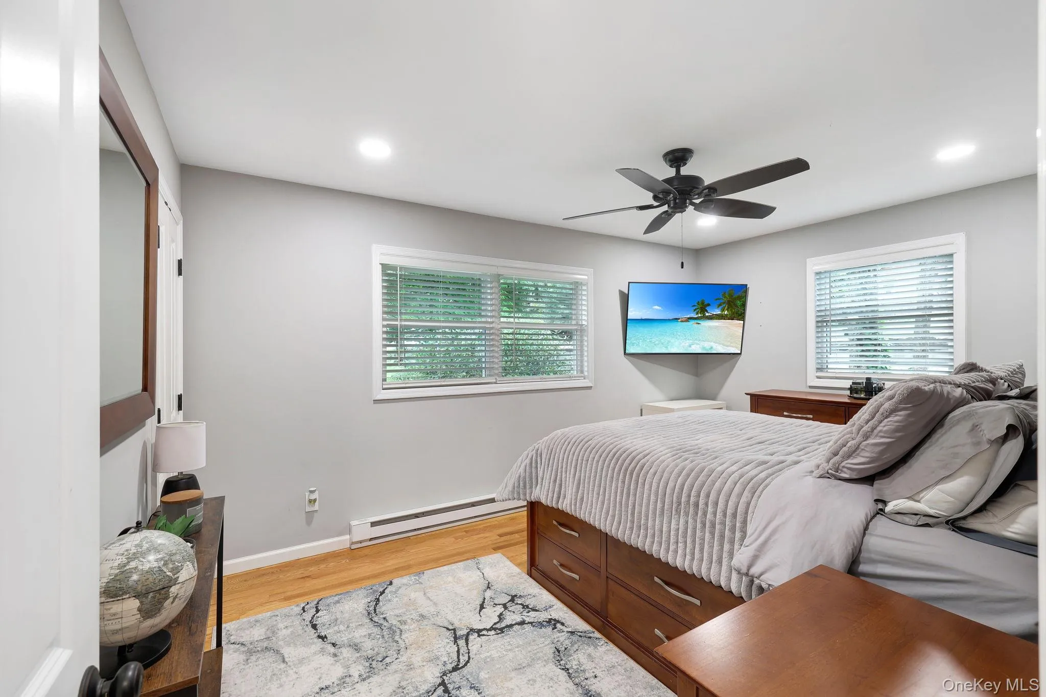Primary Bedroom with Ceiling Fan, Hardwood floor, Recessed Lights Primary Bedroom with Ceiling Fan, Hardwood floor, Recessed Lights