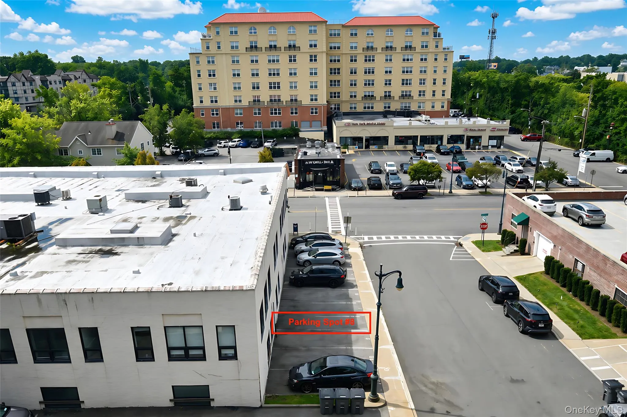 View of parking space from balcony. Deli on corner has all of your grocery needs! View of parking space from balcony. Deli on corner has all of your grocery needs!