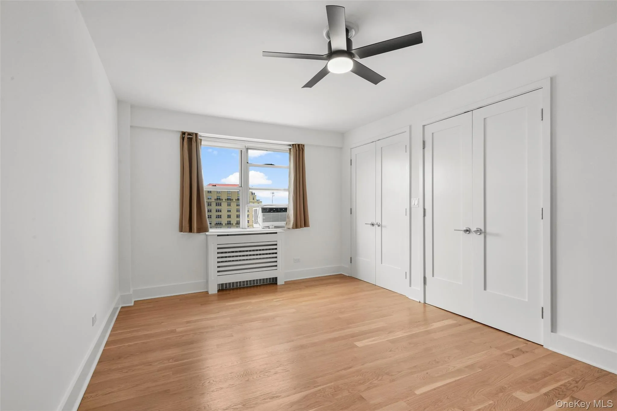 Secondary bedroom, two double-door closets Secondary bedroom, two double-door closets