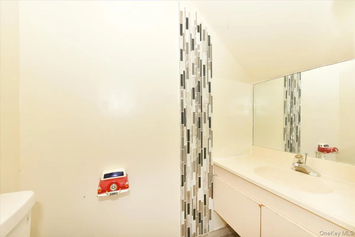 Half bathroom off den Half bathroom off den