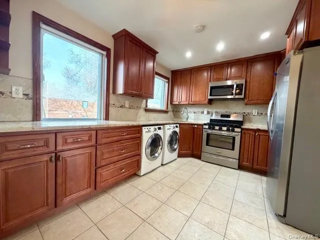 washer and dryer installed . washer and dryer installed .