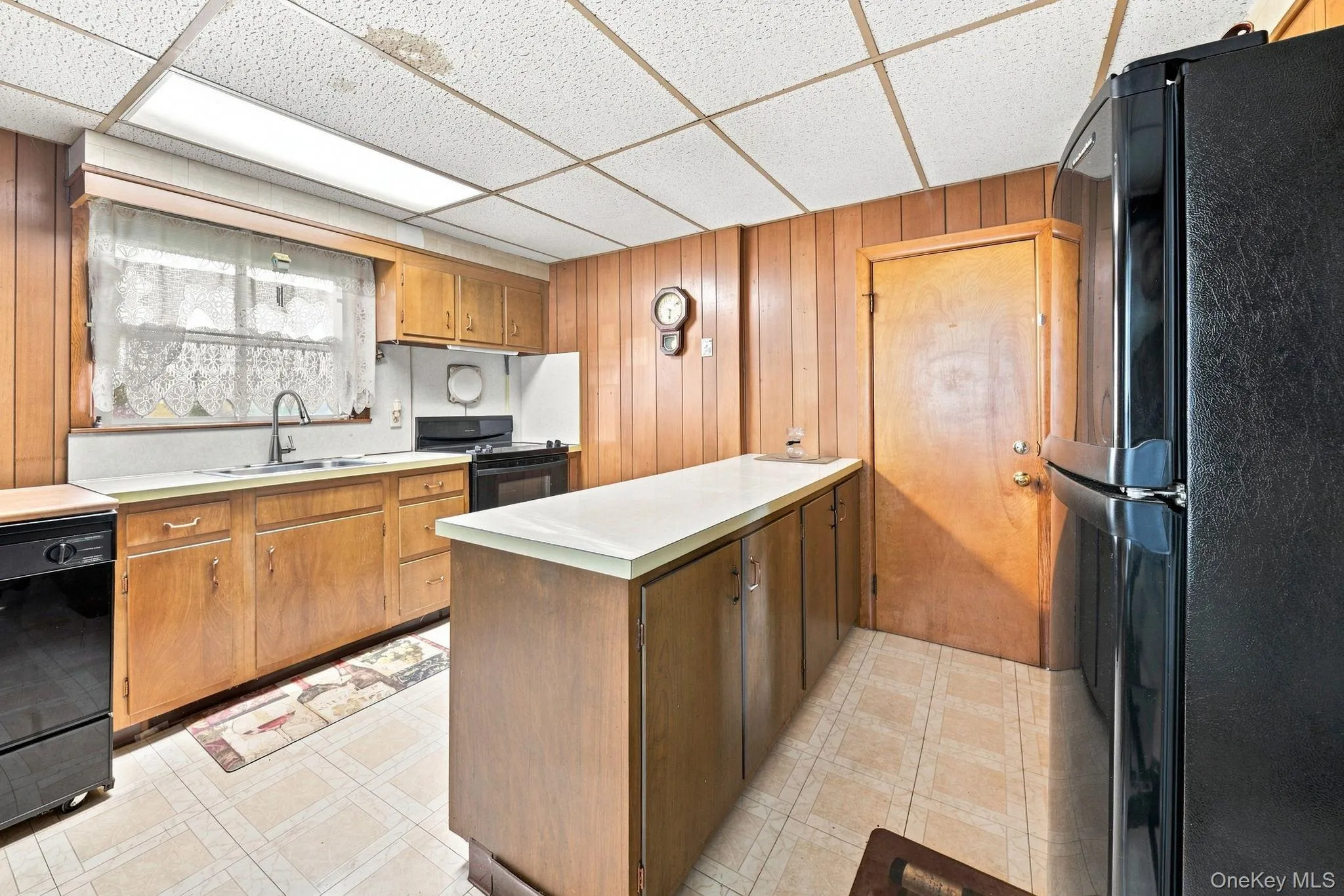 Spacious kitchen with long island and eating area Spacious kitchen with long island and eating area