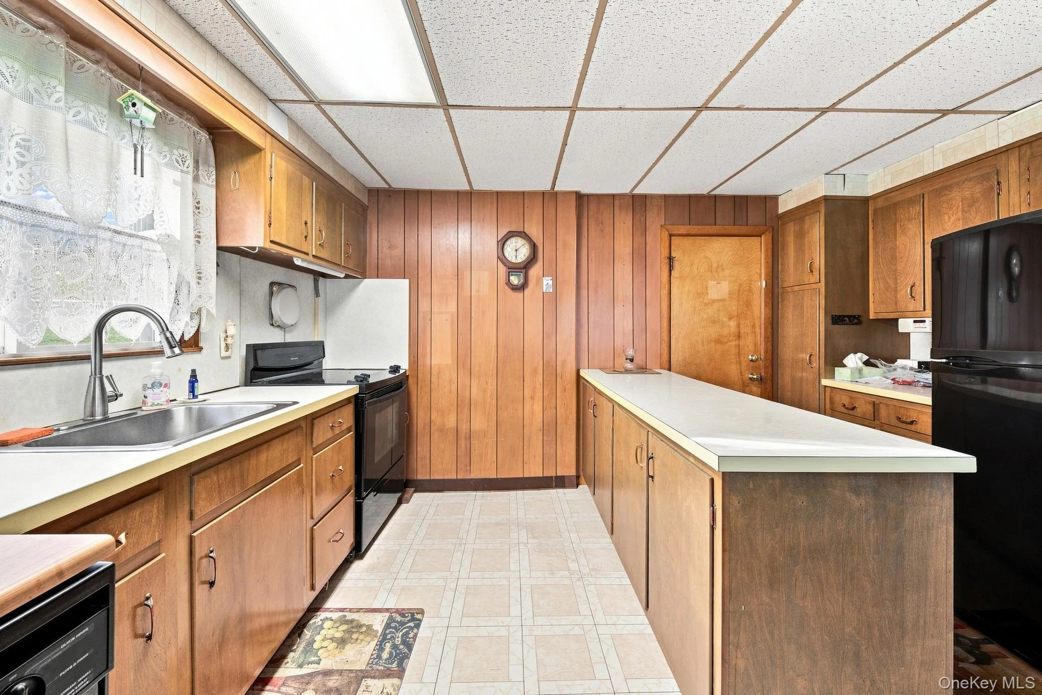 Spacious kitchen with long island and eating area Spacious kitchen with long island and eating area