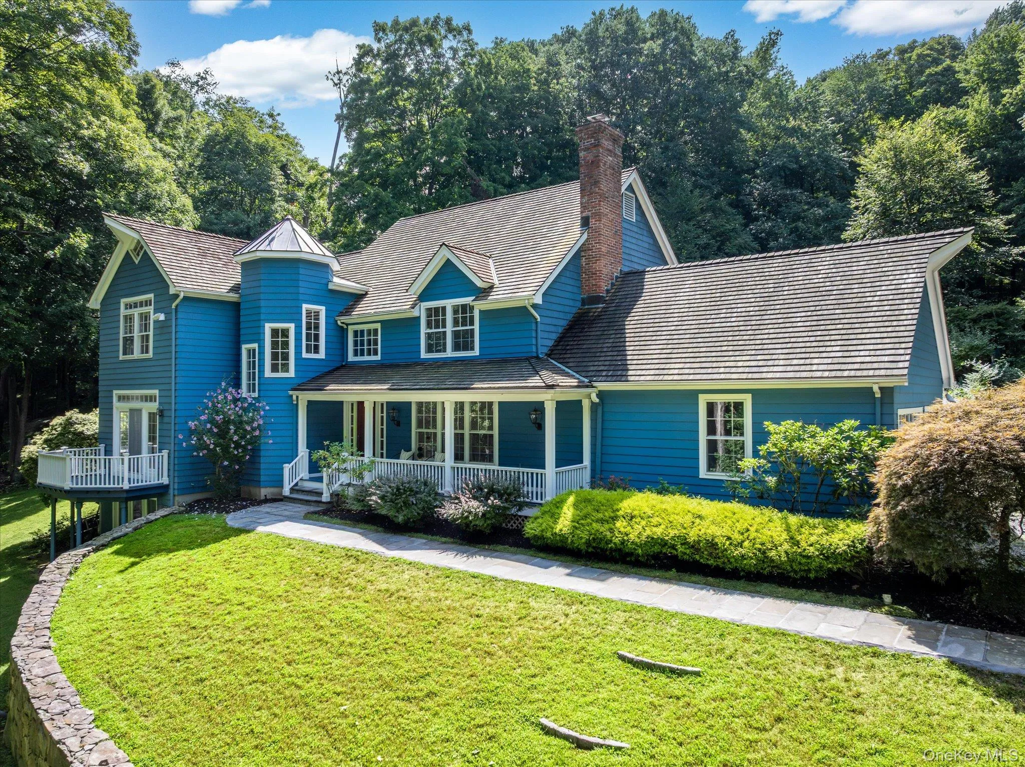 Showing covered front porch and balcony Showing covered front porch and balcony