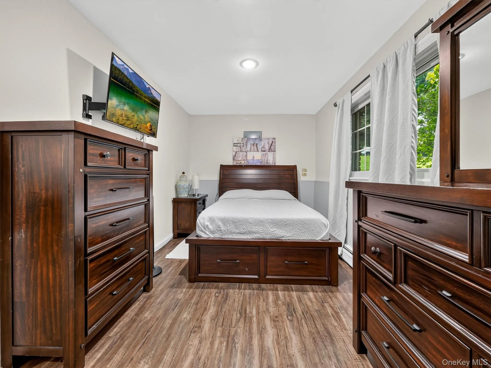 Recessed ceiling lighting, and a window with natural light, bedroom Recessed ceiling lighting, and a window with natural light, bedroom