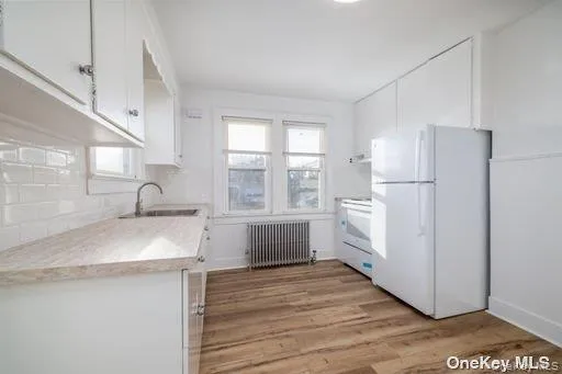 Kitchen with Electric Stove and Refrigerator Kitchen with Electric Stove and Refrigerator
