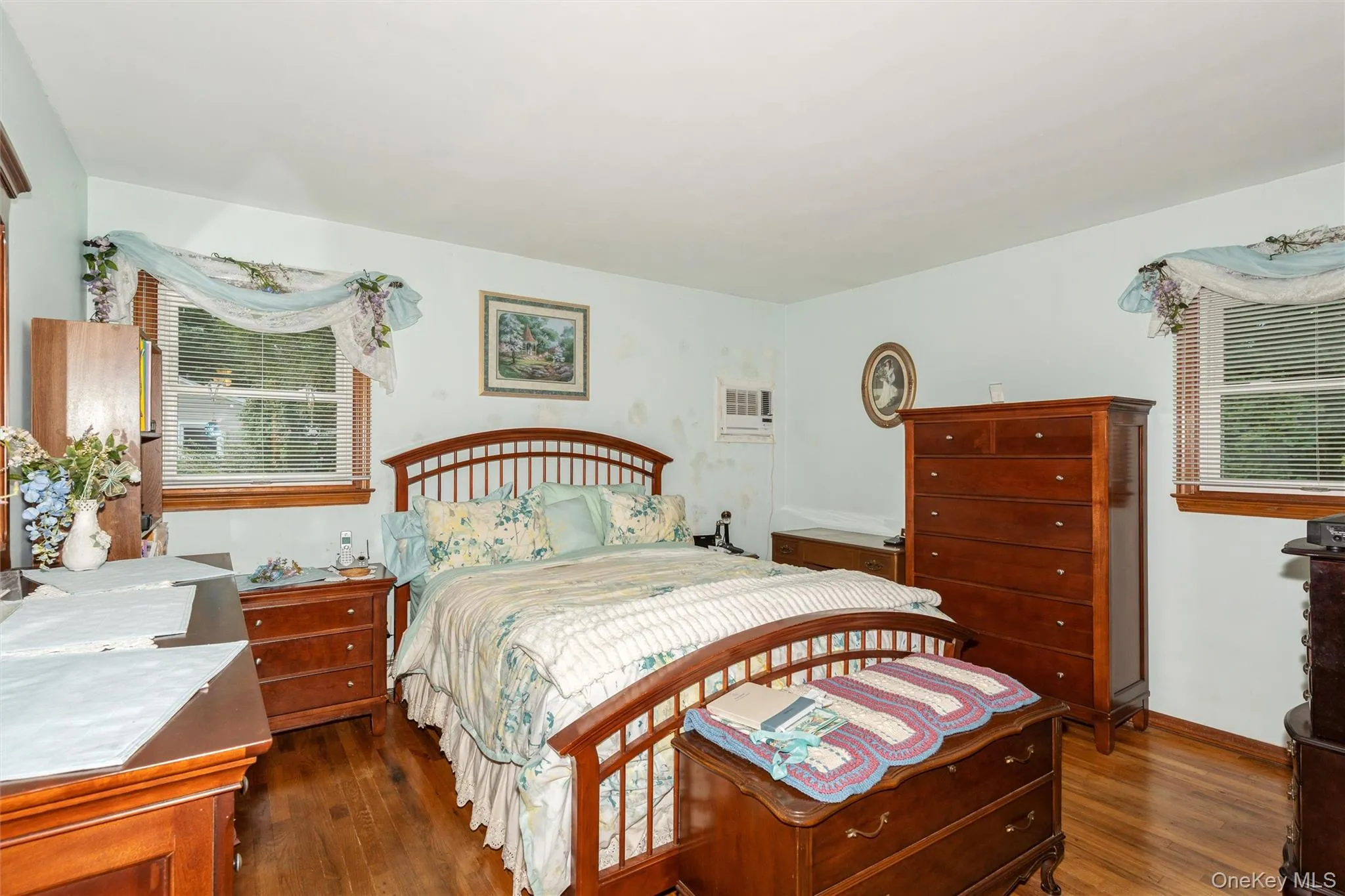 The primary bedroom has lots of space, hardwood floors, and window(s) PLUS an adjoining primary bathroom too! The primary bedroom has lots of space, hardwood floors, and window(s) PLUS an adjoining primary bathroom too!